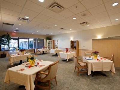 Dining Room with Tables at Village on the Green